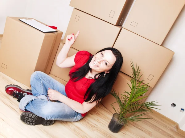 Woman moving to new house — Stock Photo, Image