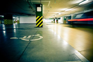 Parking garage, underground interior with car in clipart