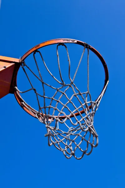 stock image Basketball hoop isolated on blue sky