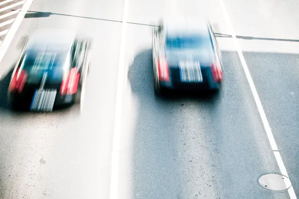 Cars in motion blur on a street of Wroclaw - cit — Stock Photo, Image