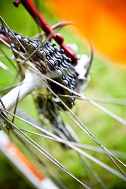 Rear racing bike cassette on the wheel with chain clipart