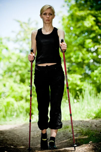 Nordic walking in summer nature — Stock Photo, Image