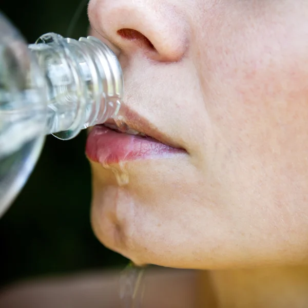 stock image Woman drinking water