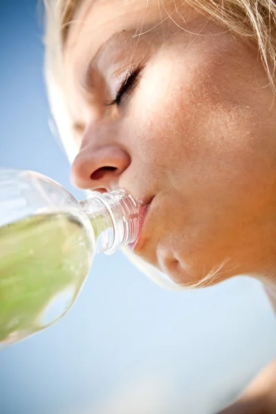 stock image Woman drinking water