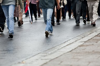 Crowd walking - group of walking together (motion blur) clipart