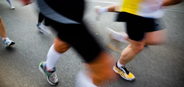 Running in city marathon - motion blur — Stock Photo, Image