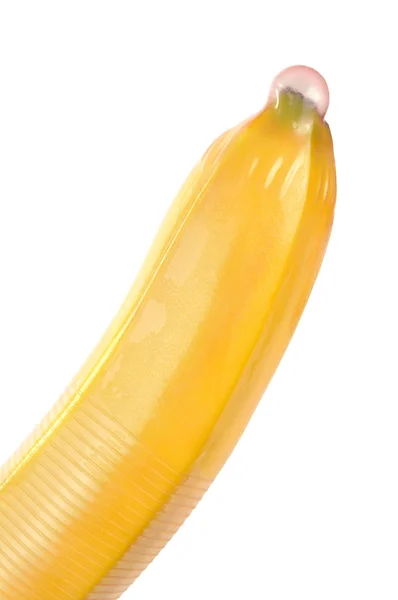 Kondom auf Banane — Stockfoto