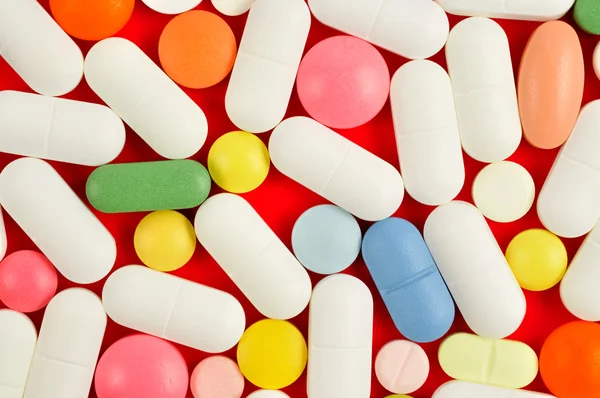 Pillole sul rosso — Foto Stock