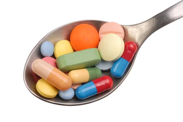 Pillole sul cucchiaio — Foto Stock