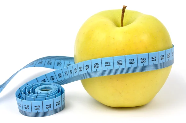 Jablko a měřicí páska — Stock fotografie