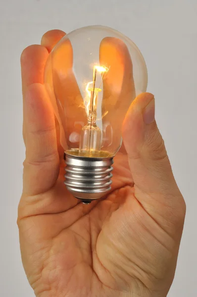 Hand with Light Bulb — Stock Photo, Image