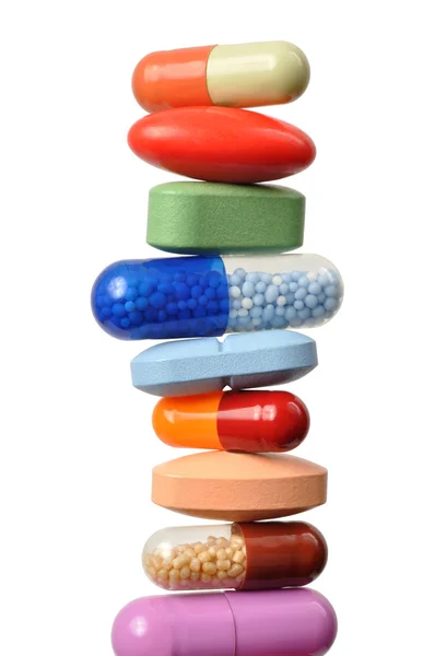 Pilha de comprimidos e cápsulas — Fotografia de Stock