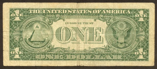 Один доллар с обратной стороны — стоковое фото