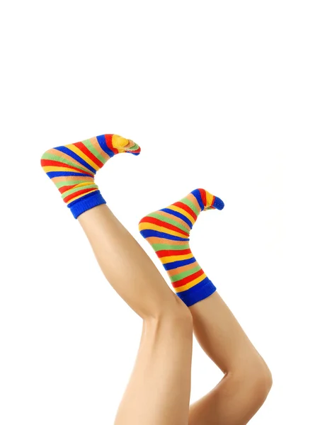 Legs in zebrine socks — Stock Photo, Image