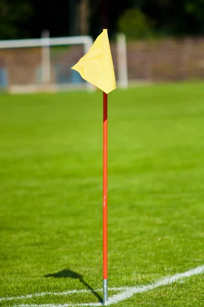 Flag on soccer field — Stock Photo, Image