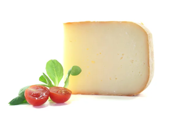 Piece of cheese with tomato — Stock Photo, Image