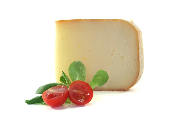 stock image Piece of cheese with tomato