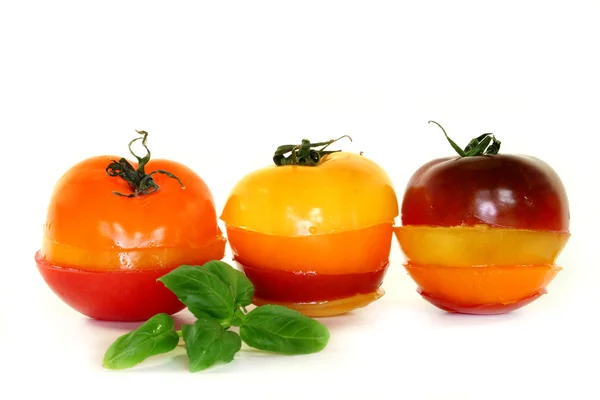 Layers of multicolored tomatoes — Stock Photo, Image