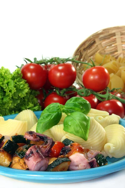 Seafood and vegetables with pasta — Stock Photo, Image