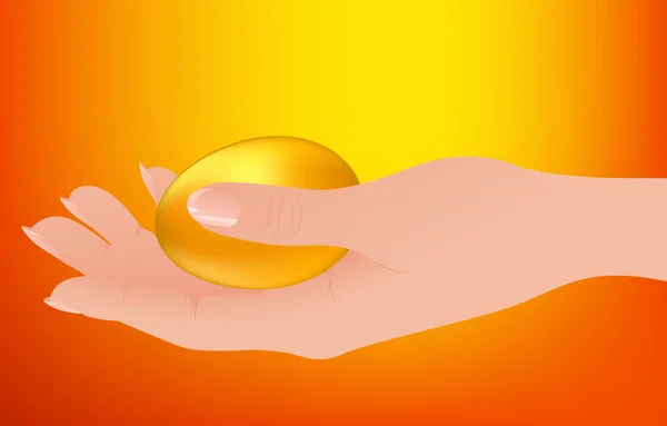 Золотое яйцо в руке — стоковый вектор