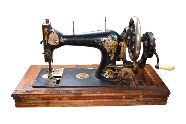 Старая чёрная швейная машина — стоковое фото