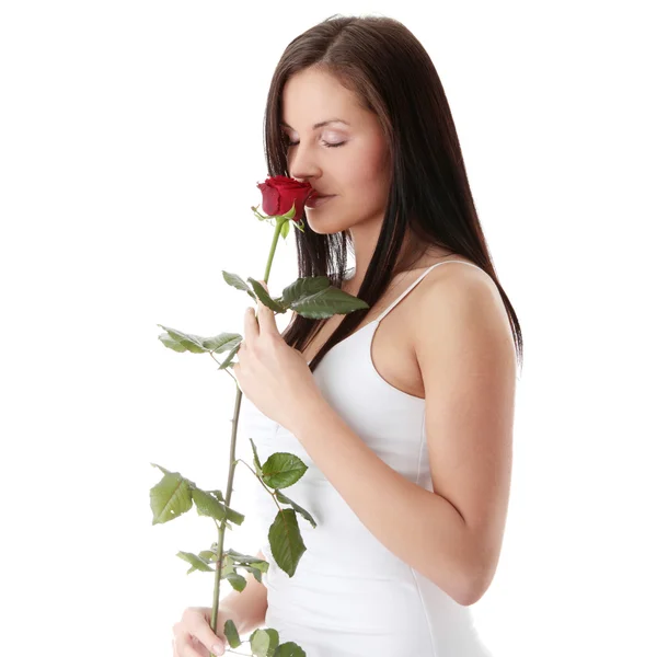 Žena s červenou růží — Stock fotografie