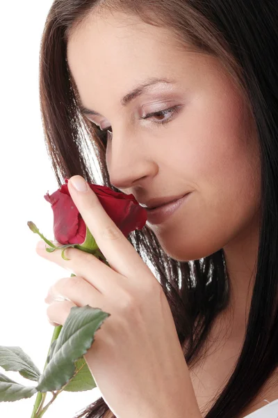 Vrouw met rode roos — Stockfoto
