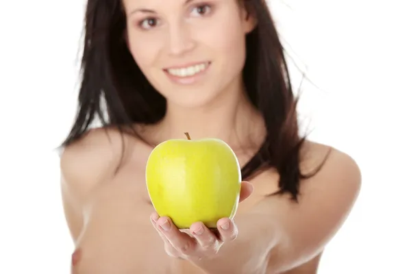 Girl with a green juicy apple — Stock Photo, Image