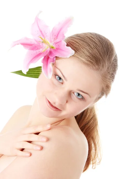 Beautiful blond woman with lily flower — Stock Photo, Image