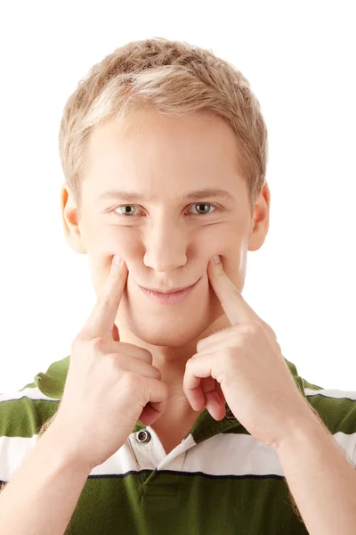 Image of a cute young male with fake smile — Stock Photo, Image