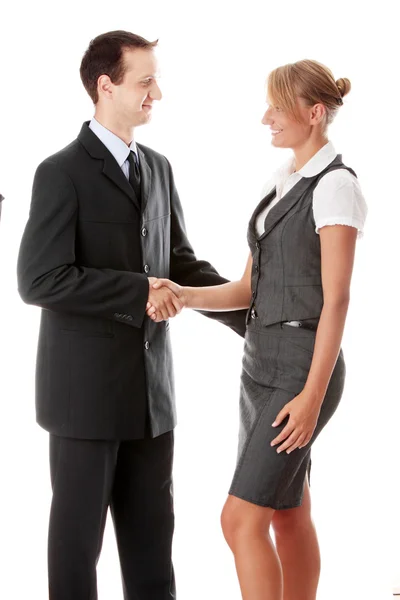 Jovem casal de negócios handshaking — Fotografia de Stock