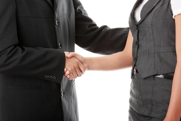 Young business couple handshaking — Stock Photo, Image