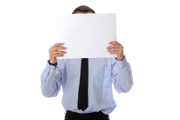 Affärsman med ett tomt papper i ansiktet — Stockfoto