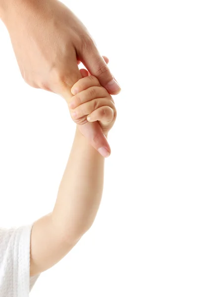 Детская рука, держащая палец матери — стоковое фото