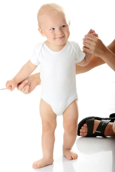 First steps of small baby — Stock Photo, Image