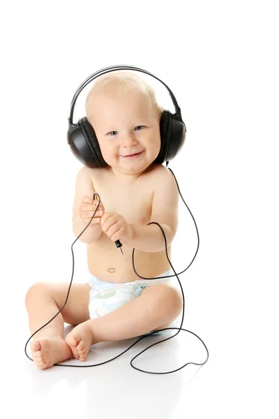 stock image Smiling baby with headphone