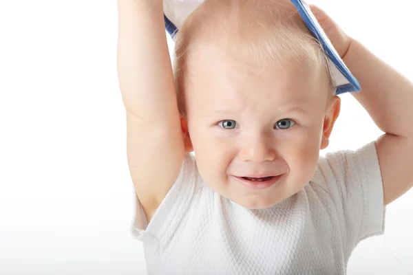 Baby trying on basebal cap — Stock Photo, Image