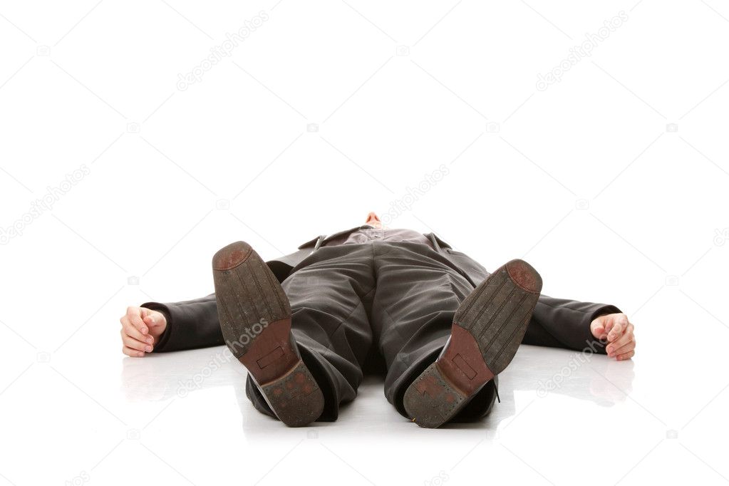 Businessman laying down in a suit