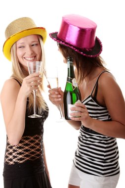Two casual young women enjoying champagne clipart