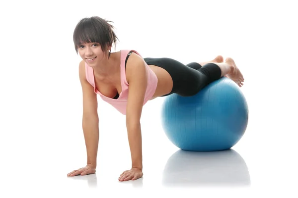 Beautiful young woman doing exercise — Stock Photo, Image