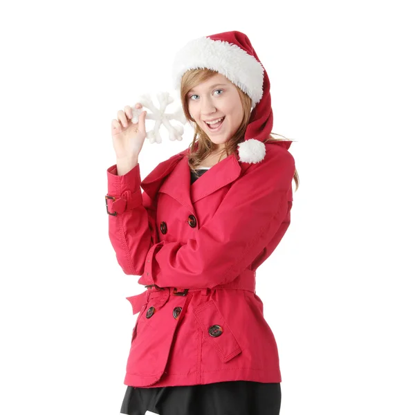 漂亮圣诞十几岁的女孩在圣诞老人帽子 — 图库照片