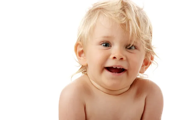 Счастливый ребенок с игрушкой — стоковое фото