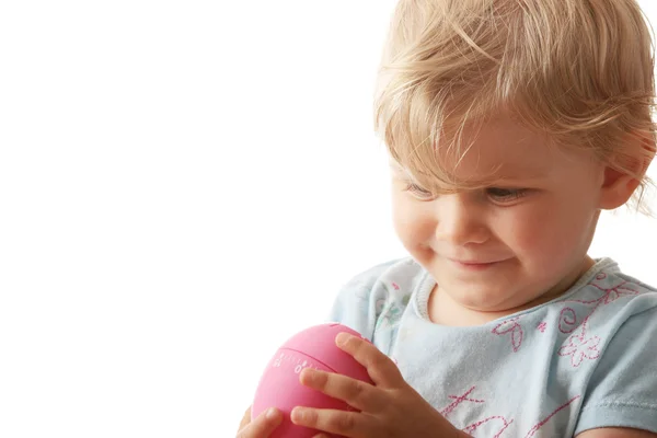 Bebé con juguete rosa —  Fotos de Stock