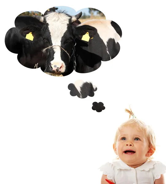 stock image Baby girl thinking about cow (milk)