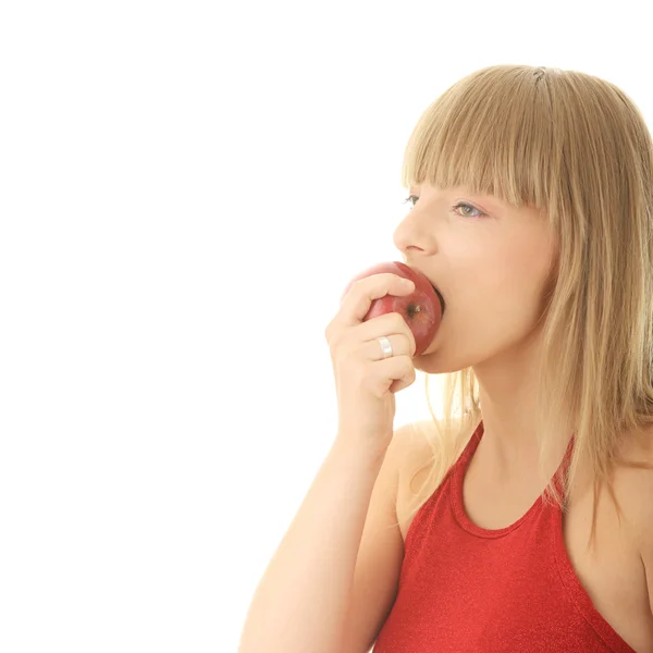 Jonge blonde vrouw met rode appel — Stockfoto