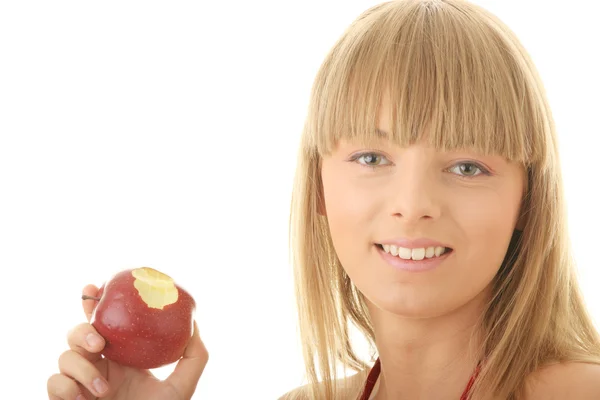 Jeune femme blonde à la pomme rouge — Photo