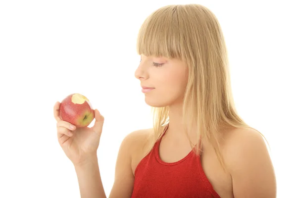 Mujer rubia joven con manzana roja —  Fotos de Stock