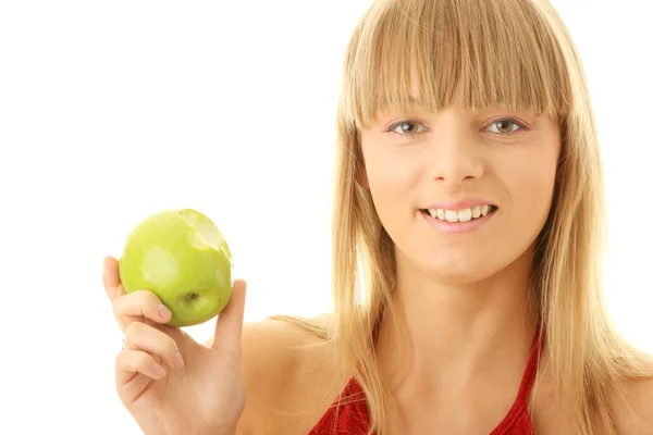 Ung blond kvinna med grönt äpple — Stockfoto