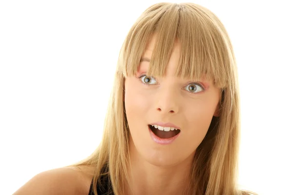 Ansikte av en ung chockad kvinna. närbild — Stockfoto