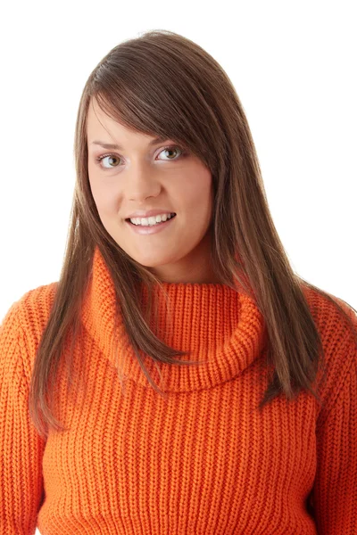 Jeune femme en pull orange — Photo